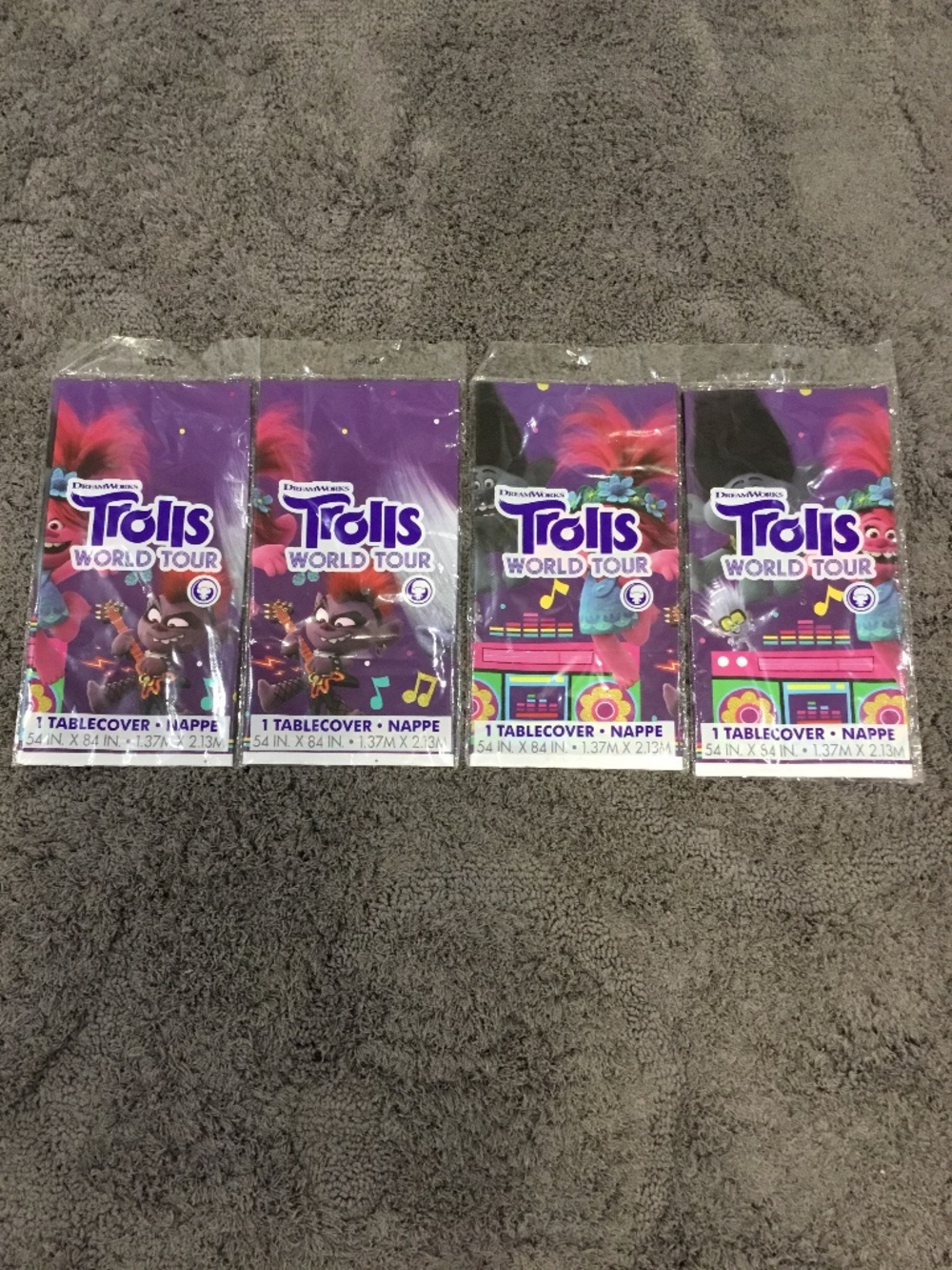 Set of 4-Dreamworks Trolls World Tour Tablecloths-Multicolored